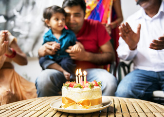 Indian family celebrating a birthday party