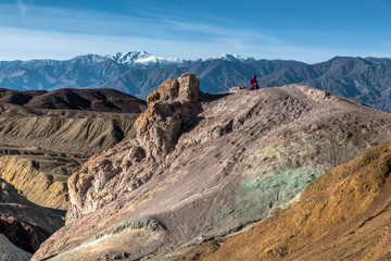 Tourist is Sitting on the Hill in Death Valley, California, United States