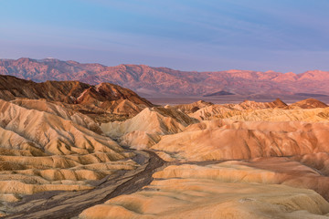 Colorful Sunrise over Zabriskie Point in Death Valley, California, United States - Powered by Adobe