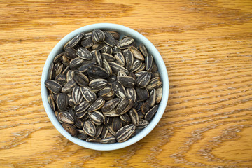 White Bowl of Sunflower Seeds in shells