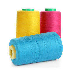 Set of sewing threads on white background