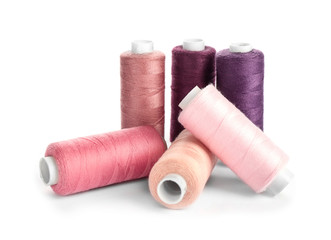 Set of sewing threads on white background