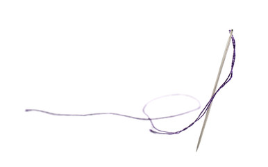 Sewing needle with thread on white background