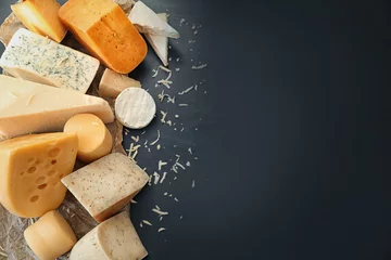 Fototapeten Variety of cheese on dark background © Africa Studio