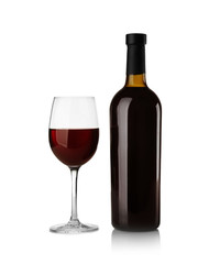 Bottle and glass with red wine on light background