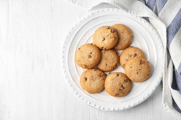 Delicious oatmeal cookies with chocolate chips on plate