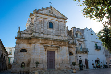 Fototapeta na wymiar Horizontal View of The Facade of the Church of Saint George. Locorotondo, South of Italy