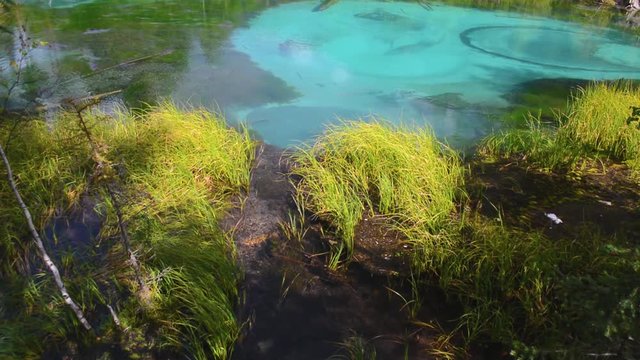 blue geyser lake in Altay mountains. Siberia. Russia.