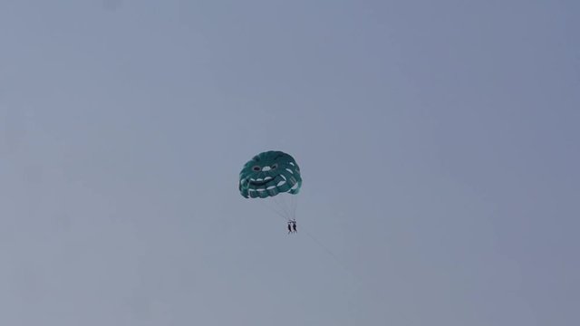 People enjoying the view while parasailing