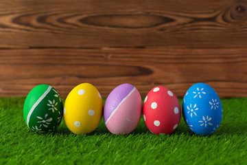 Fototapeta na wymiar Easter eggs on the grass