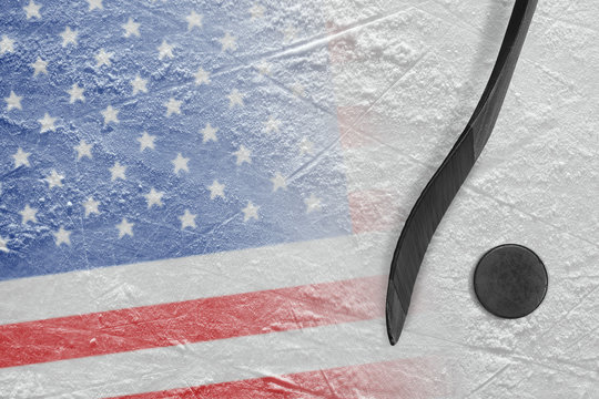 Image of American flag and hockey stick with puck