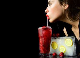 woman drink cocktail with ice cube.