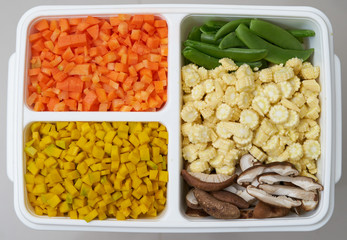 carrots corn peas mushroom pumpkins chopped in cube shape for cook ingredients like fried soup salad