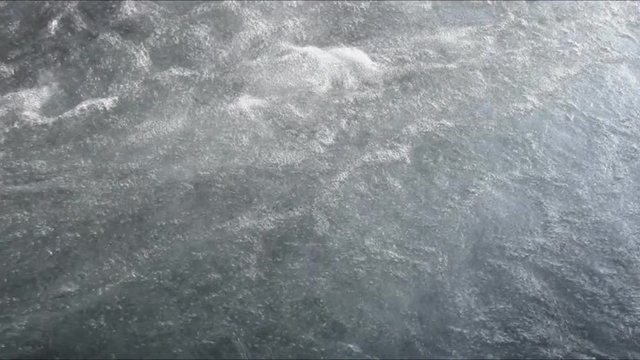 Stormy stream of water in the river in the spring, Chemal River, Altai, Russia 
