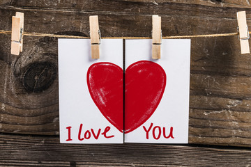 Happy Valentines day and heart. Card with Happy Valentines day and heart on wooden background