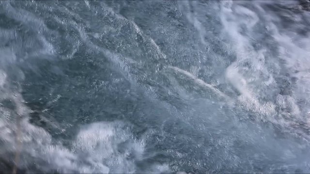 Stormy stream of water in the river in the spring, Chemal River, Altai, Russia 

