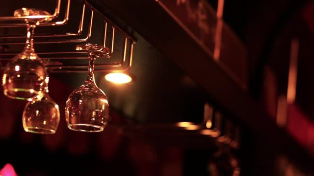 hang empty glasses over the bar