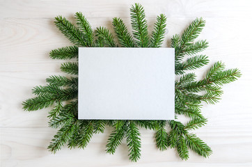 Christmas still life with gifts on a black wooden background with a Christmas tree. New Year gifts