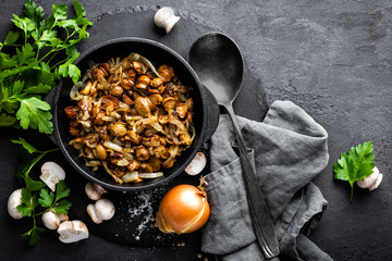Mushrooms fried with onion, top view