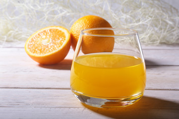 Orange and juice in glass. Morning breakfast.