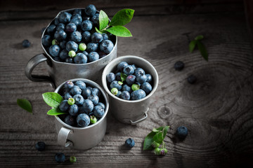 Fresh blueberry on old wooden rustic floor