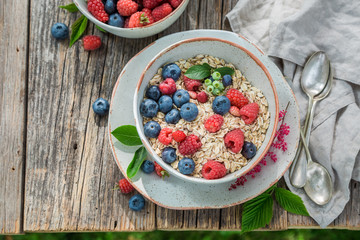 Healthy oat flakes with fresh blueberries and raspberries