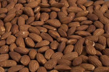 Peeled almonds closeup. For vegetarians. Almonds. Background.
