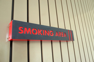 Board show zone for smoking area outside building 2
