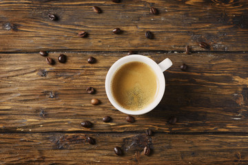 Hot strong coffee on the wooden table