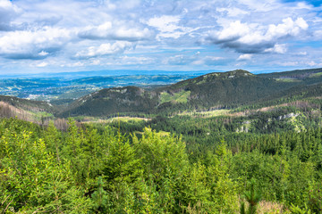 Fototapeta na wymiar Landscape of mountain valley, panorama of city Zakopane from the hiking trail in Tatra Mountains, summer, Poland