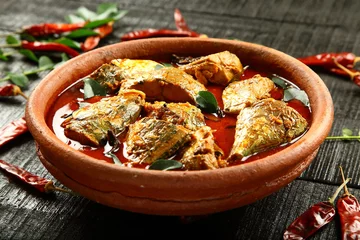 Fototapeten Homemade spicy fish curry from Kerala cuisine. © susansam90