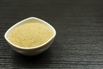 Bowl with cane sugar.