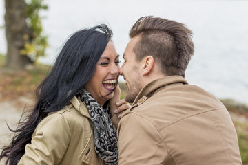 amorous couple on a park bench