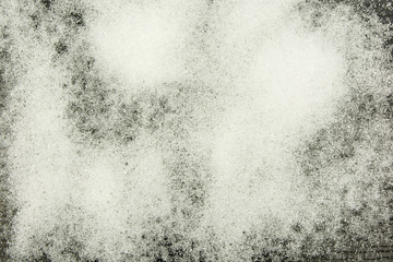 Scattered sugar on the table.