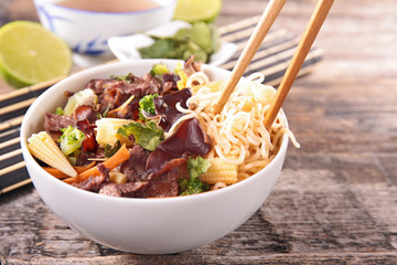 bowl of beef,vegetable and noodles