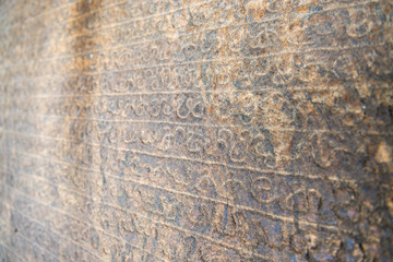 Sinhala inscription on the flat stone surface