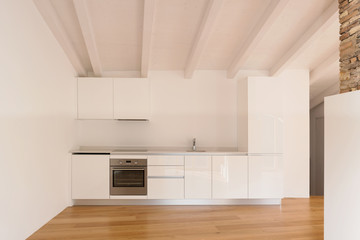 Fototapeta premium Front view of modern kitchen
