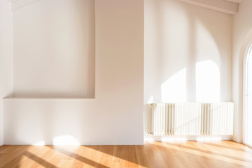 Empty room with a heater. Front view