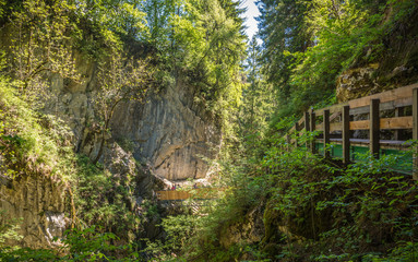Waterfalls Stanghe (Gilfenklamm) localed near Racines, Bolzano in South Tyrol, Italy. Wooden bridges and runways lead through the canyon and give a spectacular sight to the waterfalls.