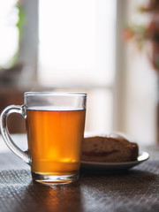 winter morning Breakfast mug of black tea and cake