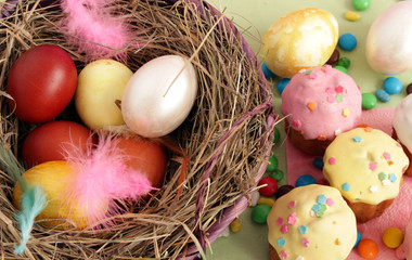 basket with Easter eggs and sweets