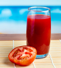 Juicy Tomato Juice Shows Thirsty Shore And Coast
