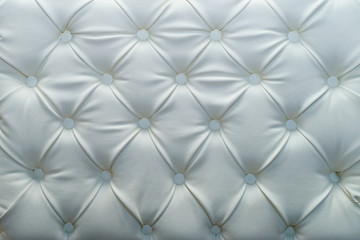 Light horizontal elegant leather texture with buttons for background and design