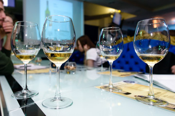 Degustation of white wine and port in a wine house