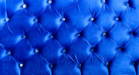 Blue horizontal elegant leather texture with buttons for background and design