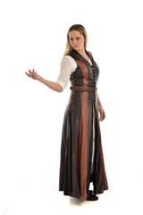 full length portrait of girl wearing brown  fantasy costume. standing pose on white studio background. 