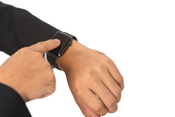 Close up of a man in black suit see at watch on his hand with white background