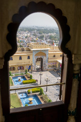 view through a window of the city palace of Udaipur, Rajasthan