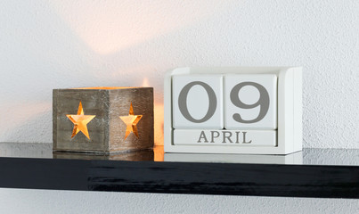White block calendar present date 9 and month April