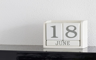 White block calendar present date 18 and month June